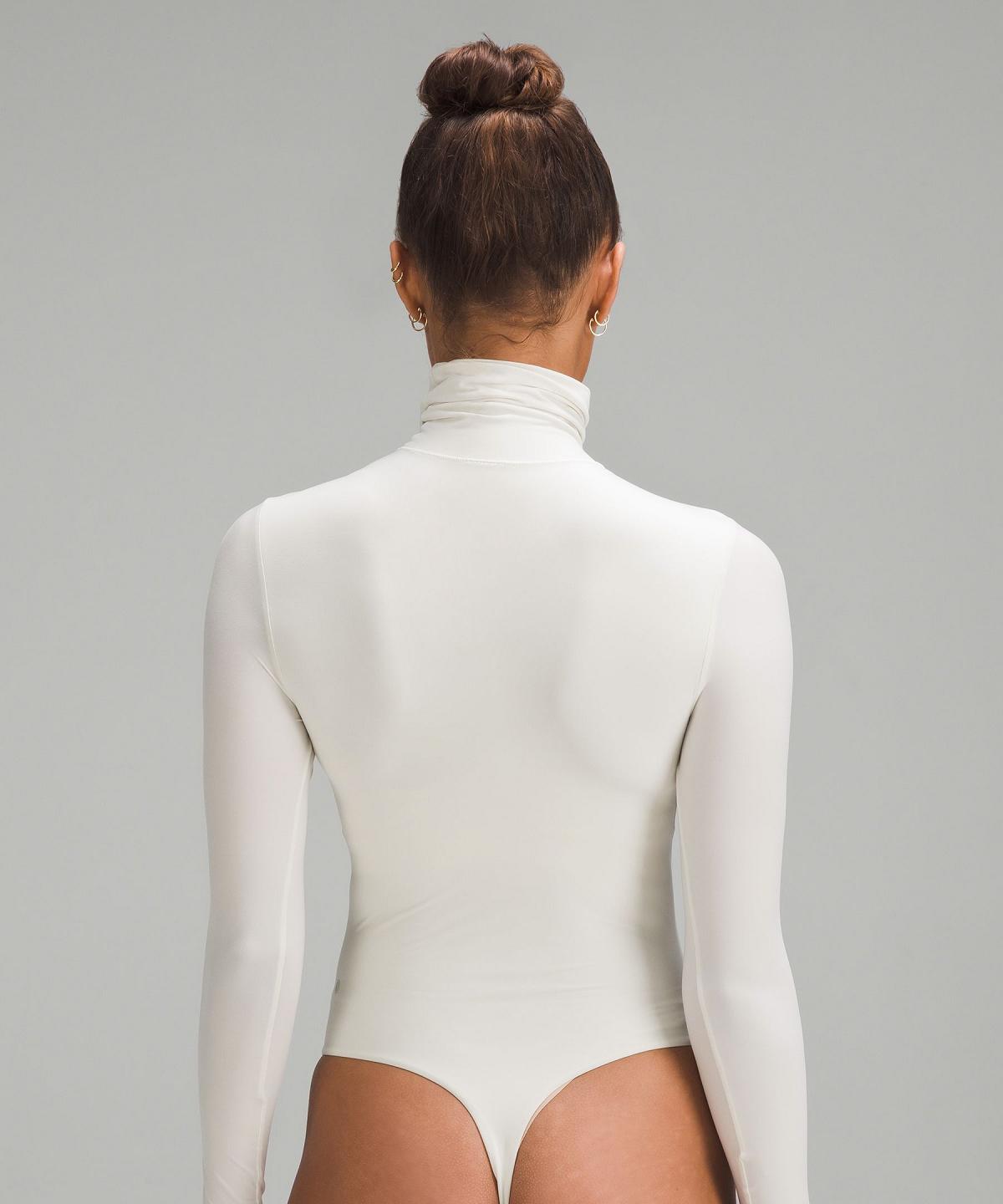 Beige Women Lululemon Wundermost Ultra-Soft Nulu Turtleneck Long Sleeve Shirts | AU_LuLu16686